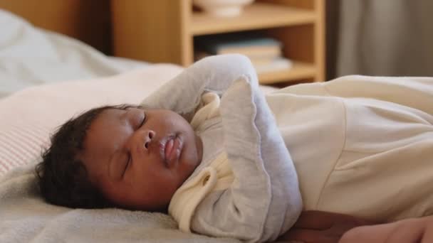 Tiny African American Baby Girl Lying Bed Her Eyes Closed — Stock Video