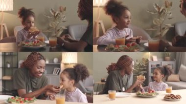 Askeri üniformalı genç Afro-Amerikan kadın asker ve sevgili küçük kızının uzun bir ayrılıktan sonra birlikte vakit geçirerek evde öğle yemeği yediği bir ekran.