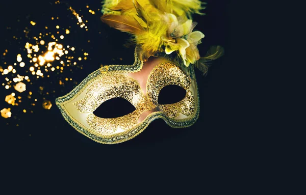 stock image Carnival mask on dark background with sparkles. Mardi Gras concept or New Years decoration. Concept festive background or design. Creative copy space. 