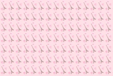 Paris kulesinin deseni ve Sevgililer Günü için gül çiçekleri. Hediye paketi kağıt tasarımı pembe renk. 