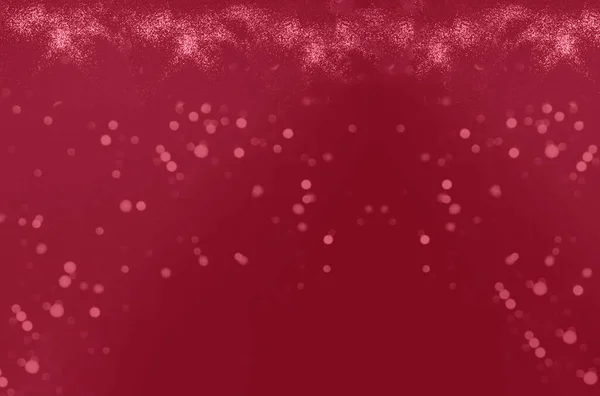 Festive background in shades of magenta with golden sparkles. Christmas and New Year mood.