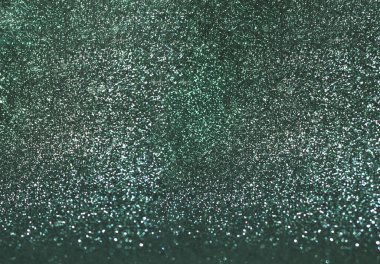 Zümrüt gölgeli ışıltılı arka plan kutlaması. Bulanık etki. Atmosferik ruh hali