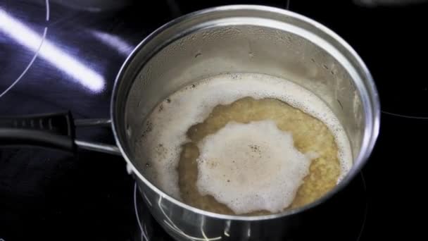 Buckwheat Porridge Cooked Metal Saucepan Kitchen Cooking Food Induction Cooker — Stockvideo