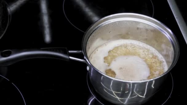 Buckwheat Porridge Cooked Metal Saucepan Kitchen Cooking Food Induction Cooker — Video
