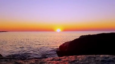 Tropical summer vacation by sea. Landscape with trees, lagoon and sunset. Holidays in tropics