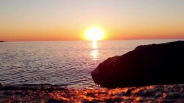 Tropical summer vacation by sea. Landscape with trees, lagoon and sunset. Holidays in tropics