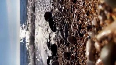 Turkish beach and sea. Coastal resort with sea waves. Vacation, summer holidays at sea