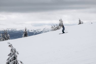 Dragobrat, Ukraine Foggy day people go to ski lifts to ski from Carpathian mountains