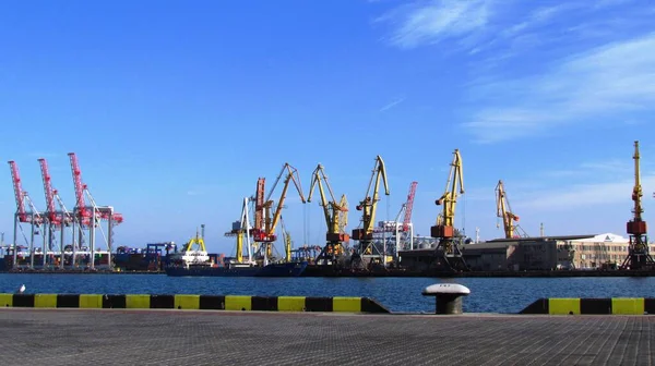 Odessa, Ukraine - Sep 10, 2018: Marine Industrial Commercial Port. Industrial zone of Odessa sea port. Container cranes. Cargo container terminal of sea freight industrial port. . High quality photo