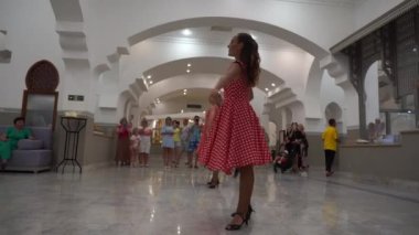 Sharm El Sheikh, Egypt - may 19, 2021 : Young European artists perform in a restaurant in front of tourists during dinner in Sharm El Sheikh , South Sinai, Egypt