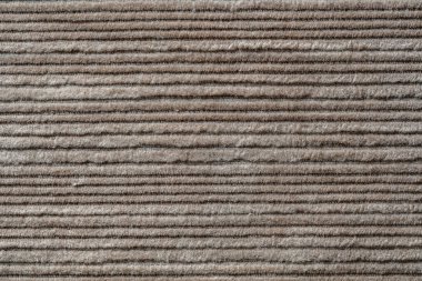 Bej renkli kadife kumaş kumaşın dokusu. Kadife kumaş arka plan veya doku. Görüntüyü kapat