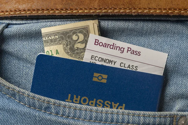 Dólares Passaporte Azul Cartão Embarque Nas Calças Ganga Perto Conceito — Fotografia de Stock