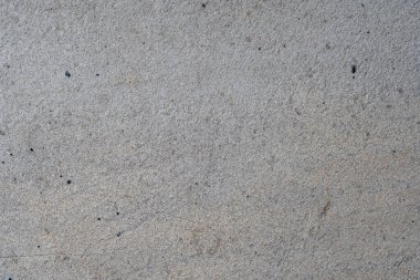 Gray concrete street wall background or texture, close up