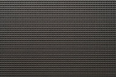 Siyah hoparlör kafes arka planı ya da dokusu, kapatın. Arkaplan için soyut metalik ağ deseni