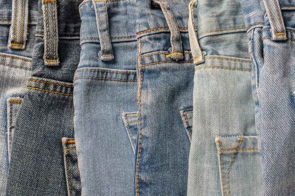 Sacco Pantaloni Jeans Vicino Sfondo Denim Concetto Acquisto Vendita Shopping — Foto Stock