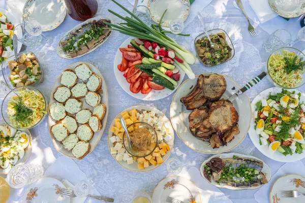 stock image Top of view full table of ukrainian meals on the table for eat. Table with many ready meals and food, outdoors, close up