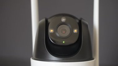 Close-up home security camera 360 on background. CCTV security camera. Technologies for monitoring and protection of territory