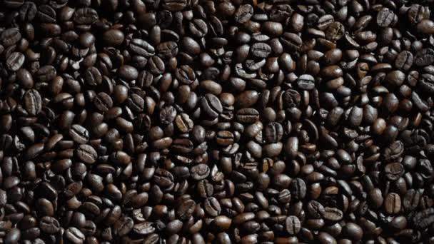 Background Fresh Roasted Coffee Beans Close Top View Rotating Dark — 图库视频影像