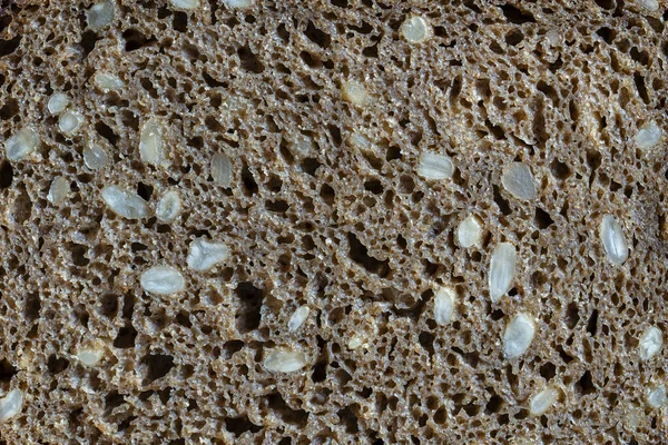 Abstraktní Pozadí Nebo Textura Domácí Černý Chléb Slunečnicovými Semínky Zblízka — Stock fotografie