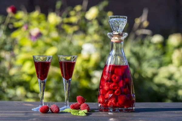 Homemade Red Raspberry Brandy Glasses Glass Bottle Wooden Table Summer — Stock Photo, Image