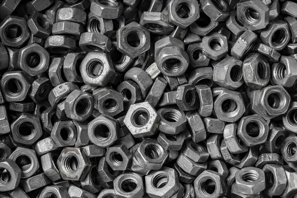 Viele Metallmuttern Hintergrund Verchromte Muttern Nahaufnahme Draufsicht Stahlmuttern Muster Werkzeuge — Stockfoto