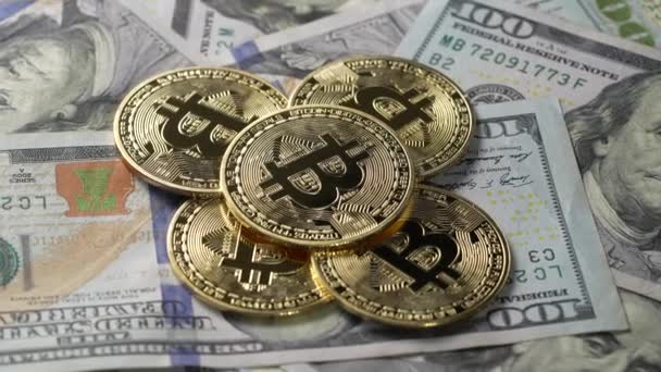 Close Metal Golden Bitcoin Crypto Currency Coins 100 Dollar Bills — Stock Video