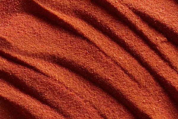 カリウム二酸化カリウムの小さな明るいオレンジ色の結晶 閉じる 抽象的なカラフルな背景 ストック写真