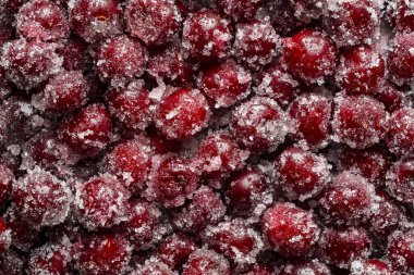 Taze kırmızı kirazlar suyu serbest bırakmak için reçel yapmadan önce beyaz şeker serpiştirilir. Hayatın tatlılığını ve zenginliğini sembolize eden sulu kiraz.