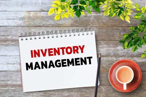 Business quotes, INVENTORY MANAGEMENT on notebooks or paper in office desk, office workplace