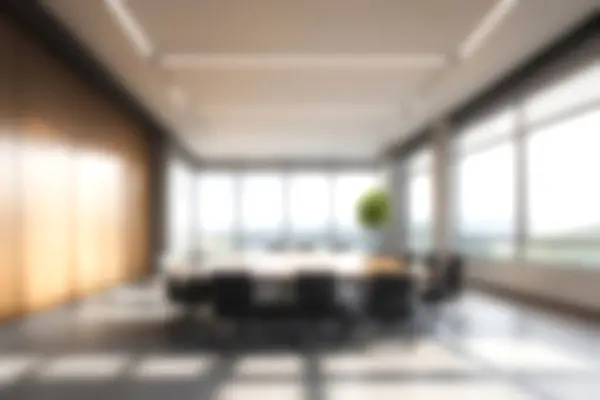 stock image Blur Modern contemporary office workplace, light and shadow, big window, Blurred interior design background.