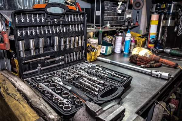 stock image Set of used chrome vanadium wrench tools closeup, wrench heads, nozzles the screwdriver in case. Professional instrument. Industrial theme