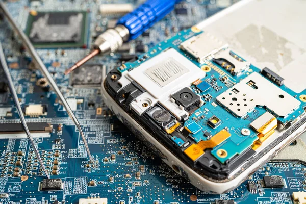 stock image Repairing and upgrade mobile phone, electronic, computer hardware and technology concept.