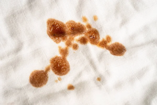 stock image Dirty sauce stain on cloth to wash with washing powder, cleaning housework concept.