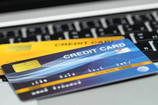 Credit card on keyboard computer, shopping online finance concept.