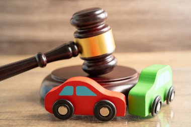 Hammer gavel judge with car vehicle accident, insurance coverage claim lawsuit court case. clipart