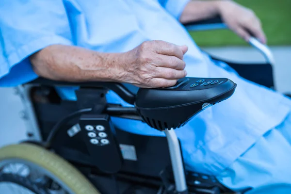 Asian Senior Woman Patient Electric Wheelchair Remote Control Hospital Healthy — Stock Fotó