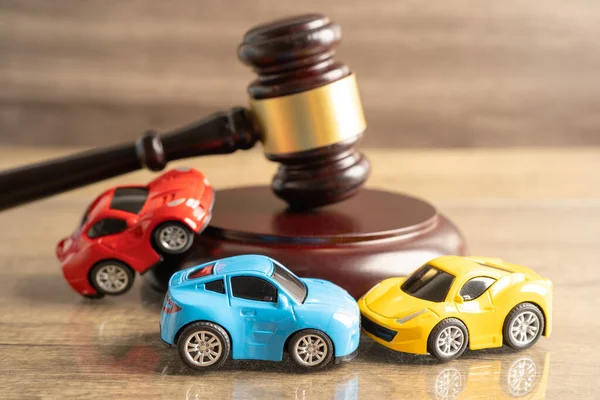 stock image Bangkok, Thailand, January 1, 2023 Hammer gavel judge with car vehicle accident, insurance coverage claim lawsuit court case.