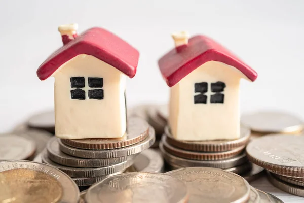 stock image House model with growing plant on stack of coin money, home loan, saving plan, installment payment finance and banking concept.