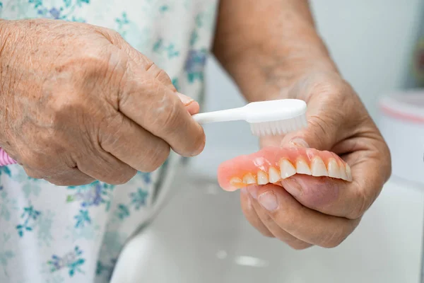 Asian Elderly Woman Patient Holding Use Denture Healthy Strong Medical — Foto de Stock