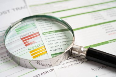 Magnifying glass on graph paper. Financial development, Banking Account, Statistics, Investment Analytic research data economy, Business concept.