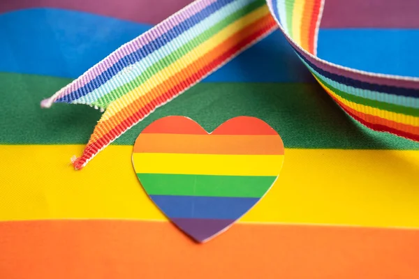 LGBT rainbow colorful flag heart and ribbon, symbol of lesbian, gay, bisexual, transgender, human rights, tolerance and peace.