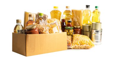 Bağış, depolama ve teslimat için yiyecek. Çeşitli yiyecekler, makarna, yemek yağı ve karton kutuda konserve yiyecekler..
