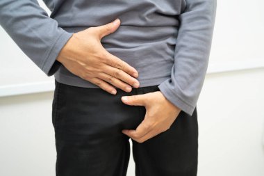 Fıtık, Asyalı erkek mide ağrısı, karın ağrısı ve üroloji problemi..