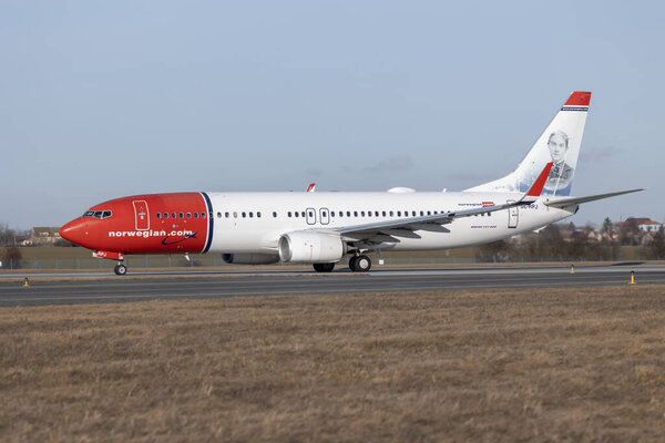 PRAGUE - December 27, 2023: Norwegian (Karin Larsson Livery) Operated by Norwegian Air Sweden Boeing 737-8JP REG:SE-RPJ at Vaclav Havel Airport Prague. Norwegian Air Shuttle ASA, trading as Norwegian, is a Norwegian low-cost airline.
