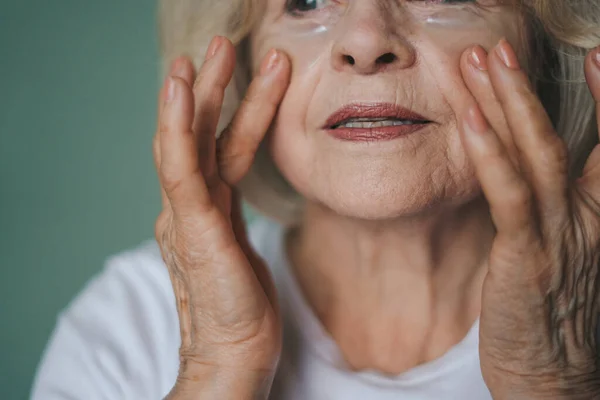 Close Portrait Retiree Woman Applying Nourishment Eyes Patches Looking Fresh — Stock Photo, Image