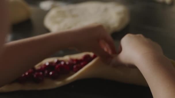 Hands Boy Trying Glue Dough Filled Cherry Jam Make Pies — Stock Video