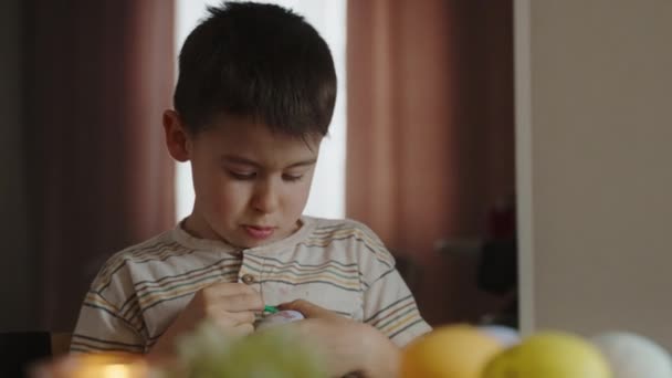 Adorable Little Boy Painting Eggs Easter Home Celebrating Holidays Home — Stock Video