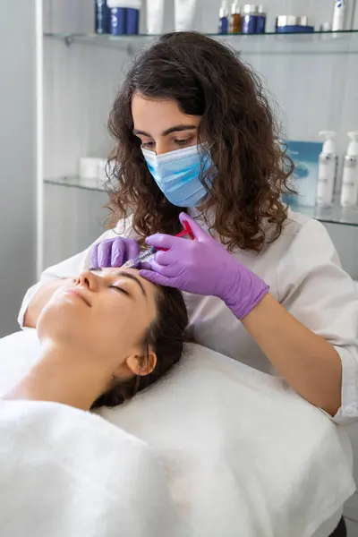 Cosmetologist Making Rejuvenating Wrinkles Injections Forehead Beautiful Woman Female Aesthetic Stock Image