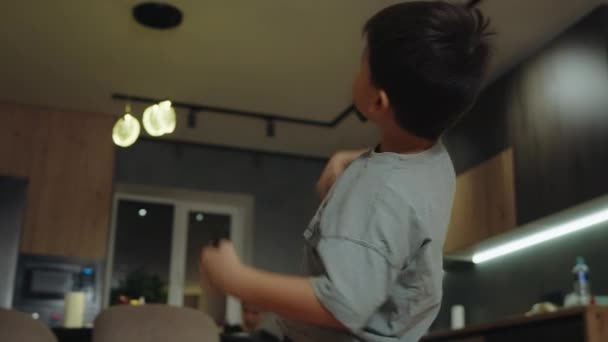 Little Boy Imagining Beating Someone Gesticulating Talking Aggressively Alone Him — Stock Video