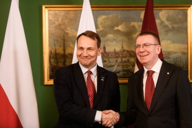 RIGA, LATVIA. 27th March 2024. Radoslaw Sikorski (L), Minister of Foreign Affairs of Poland meets with Edgars Rinkevics (R), President of Latvia. clipart